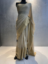 Beige Pure Muga silk skirt border saree with tassels