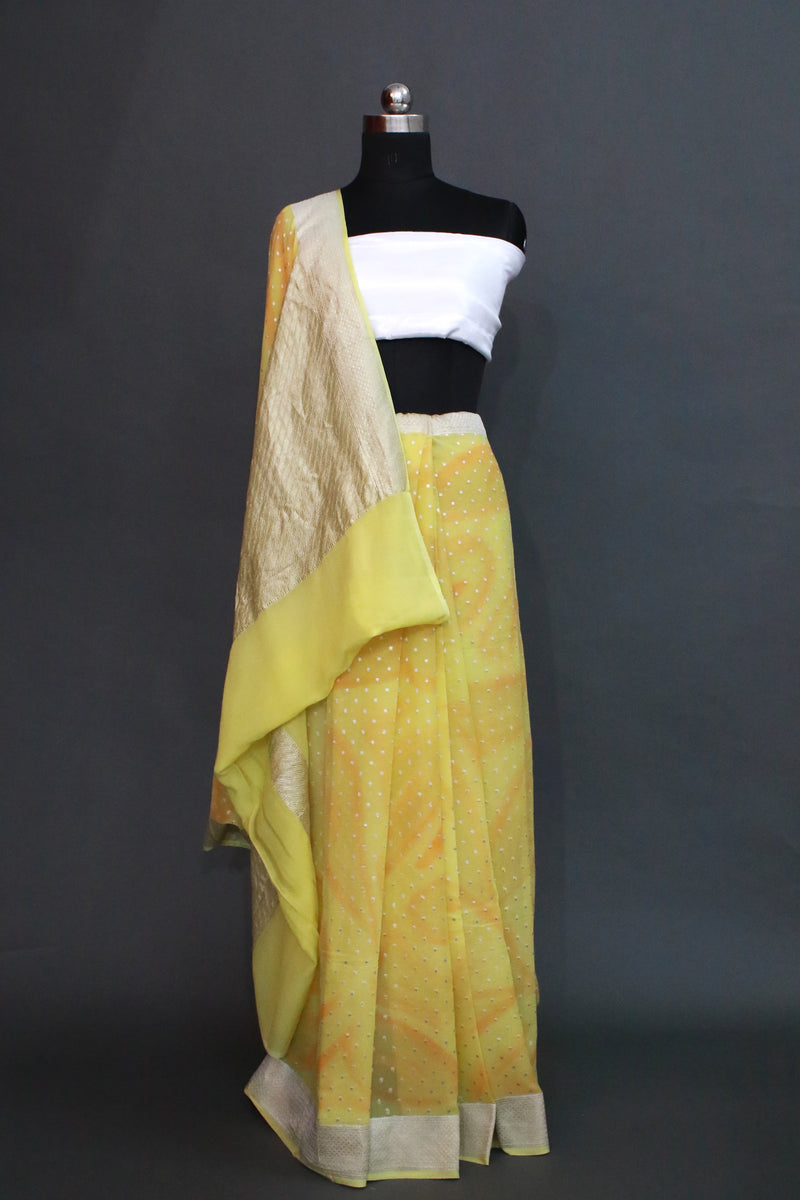 Lemon yellow khaddi georgette water zari saree with orange texture