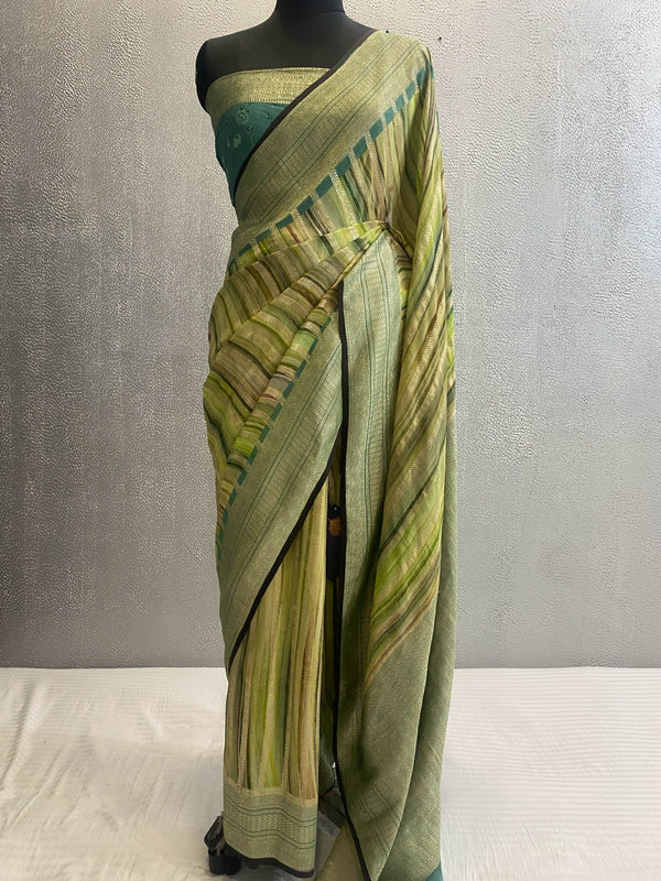 Pure Silk Khaddi georgett banarasi saree in geometrical pattern design with use of light gold color zari