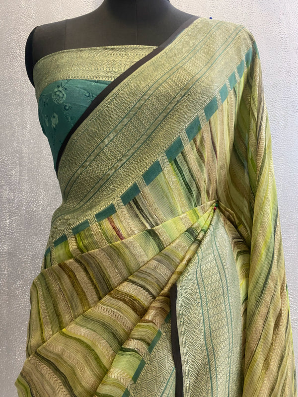 Pure Silk Khaddi georgett banarasi saree in geometrical pattern design with use of light gold color zari