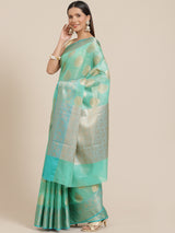 Teal green colored tissue silk saree