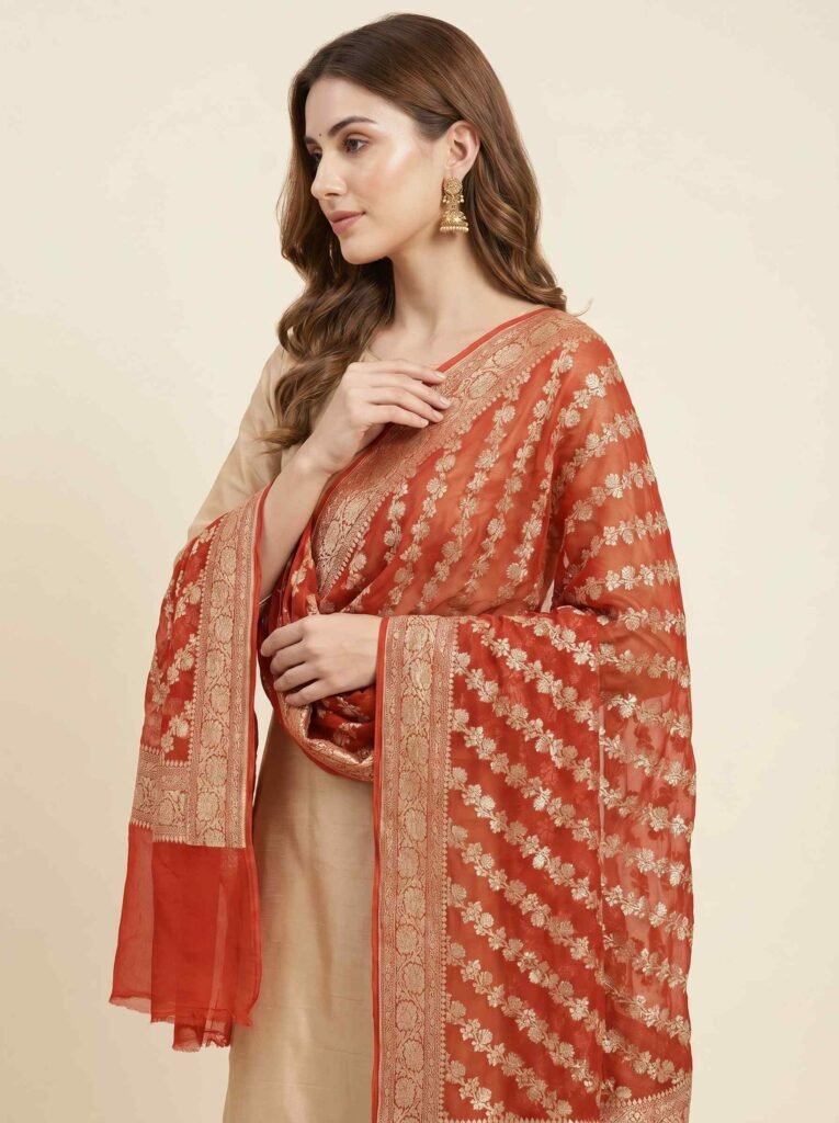 Premium Khaddi Georgette Silk Pure Banarasi Dupatta in orange with diagonal floral zari work and detailed zari border