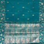 Teal blue Banarasi saree with floral booti work