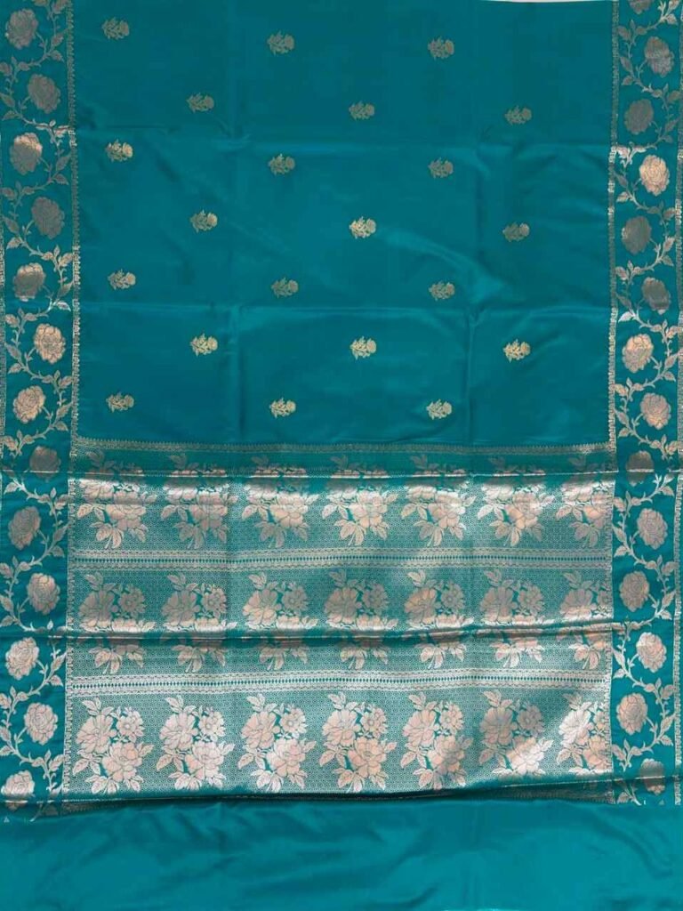 Teal blue Banarasi saree with floral booti work