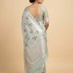 Premium pista green cotton silk pure Banarasi digital print saree with floral motifs and elegant silver zari border and pallu