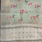 Premium pista green cotton silk pure Banarasi digital print saree with floral print and intricate zari border and pallu