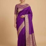 Premium purple Semi Kataan Silk Banarasi saree with plain body and intricate zari border and aanchal work