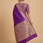 Premium purple Semi Kataan Silk Banarasi saree with plain body and intricate zari border and aanchal work