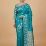 Teal blue Banarasi saree with floral booti work