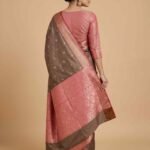 Shop Premium Semi Silk Banarasi Saree in elegant Chiku Brown with Pink contrast, delicate zari buti work and richly detailed pallu. Perfect for weddings, festivals and special occasions.