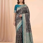 Premium Chiniya Silk Banarasi saree in black and sea green contrast with intricate floral jaal zari work and detailed pallu