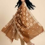 Premium Munga Silk Pure Banarasi Dupatta in brown with geometric motifs, zari work, woven border and tassel detailing
