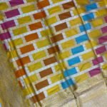 Premium handwoven Kataan Silk Banarasi Rangkart saree in mustard with colourful block work, zari border and detailed pallu