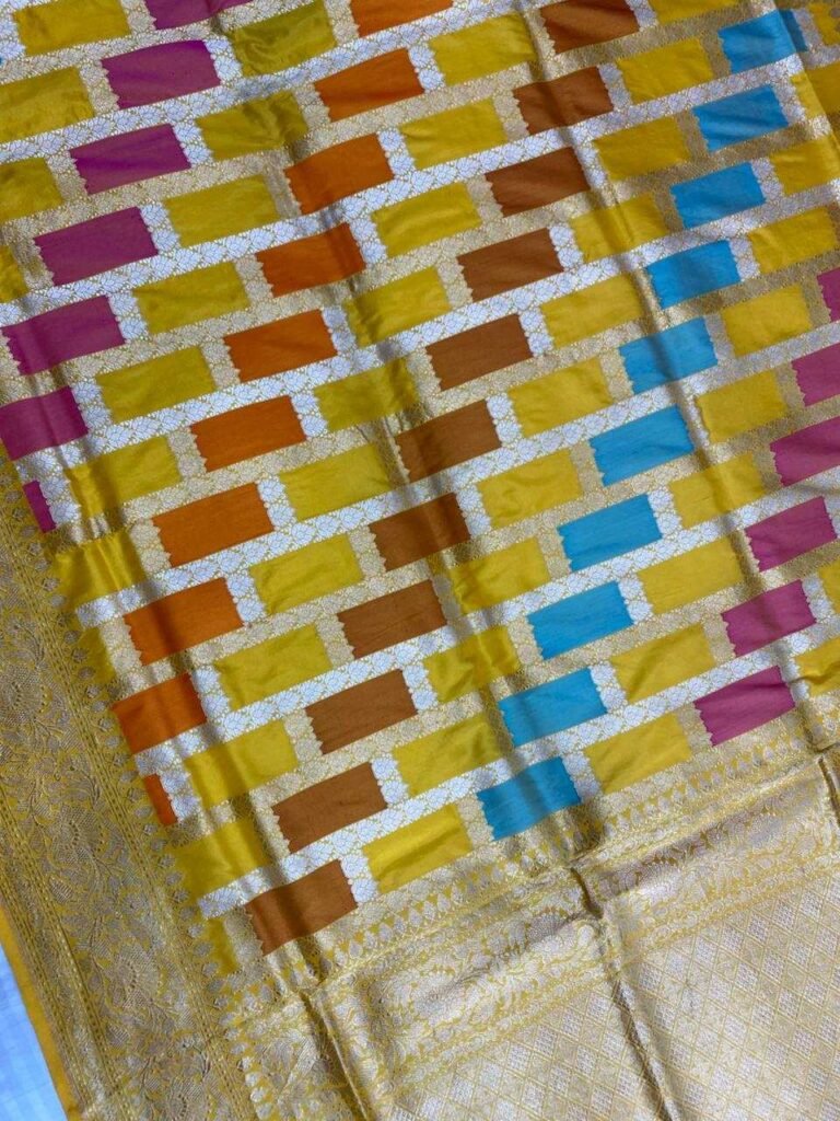 Premium handwoven Kataan Silk Banarasi Rangkart saree in mustard with colourful block work, zari border and detailed pallu