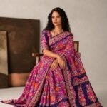 Premium handwoven Kataan Tissue Silk Banarasi saree in pink with colourful floral Meenakari work and detailed border and pallu