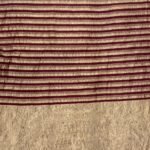 Premium Munga Silk Banarasi saree in maroon and gold with elegant zari stripe work and rich traditional border and pallu
