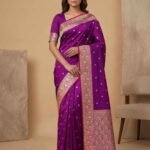 Premium semi Kataan silk Banarasi saree in purple colour with floral zari border and pallu and delicate booti work