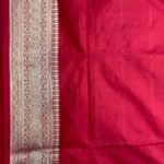 Premium handwoven Kataan Silk Banarasi saree in red with bird motif work, geometric pattern, zari border and detailed pallu .