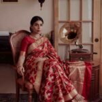 Premium handwoven Kataan Silk Banarasi saree in maroon with floral Meenakari work and intricate zari border and pallu