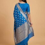 Premium Chiniya Silk Banarasi saree in teal blue with beautiful floral zari and colourful Meenakari work