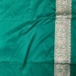 Premium handwoven Kataan Silk Banarasi saree in sea green with colourful floral Meenakari Jaal work and detailed zari border and pallu