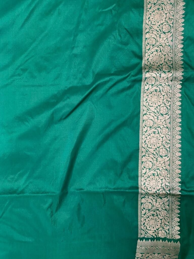 Premium handwoven Kataan Silk Banarasi saree in sea green with colourful floral Meenakari Jaal work and detailed zari border and pallu