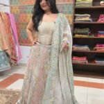 Shop Premium Customised Olive Green Banarasi Tissue Silk Lehenga with sequin, patchwork, Resham embroidery and Tikri work, paired with a matching tissue silk dupatta. Perfect for weddings and mehendi.