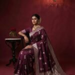 Premium handwoven Kataan Silk Banarasi saree in wine colour with beautiful zari motif work, intricate zari border and detailed pallu