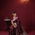 Premium handwoven Kataan Silk Banarasi saree in wine colour with beautiful zari motif work, intricate zari border and detailed pallu