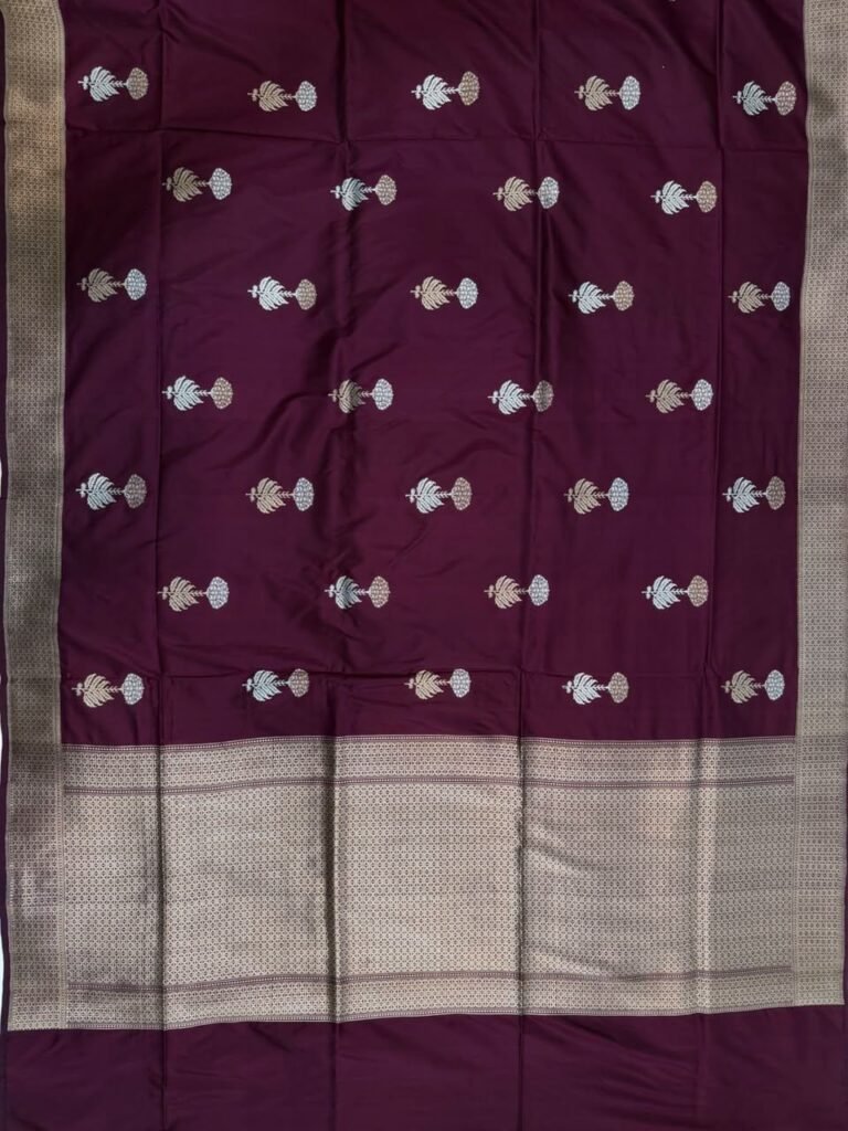 Premium handwoven Kataan Silk Banarasi saree in wine colour with beautiful zari motif work, intricate zari border and detailed pallu