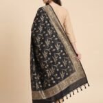 Premium black Semi Kataan Silk Banarasi dupatta featuring golden zari floral jaal motifs, an ornate woven border and decorative tassels.