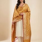 Premium mustard Semi Kataan Silk Banarasi dupatta featuring golden zari floral jaal work, an ornate zari border, pink edging and decorative tassels.