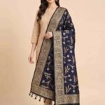 Premium navy blue Semi Kataan Silk Banarasi dupatta with golden zari floral jaal motifs, an intricate woven border and decorative tassels.