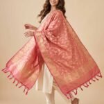 Premium peach Semi Kataan Silk Banarasi dupatta featuring golden zari floral jaal work, an ornate border and decorative pink tassels.